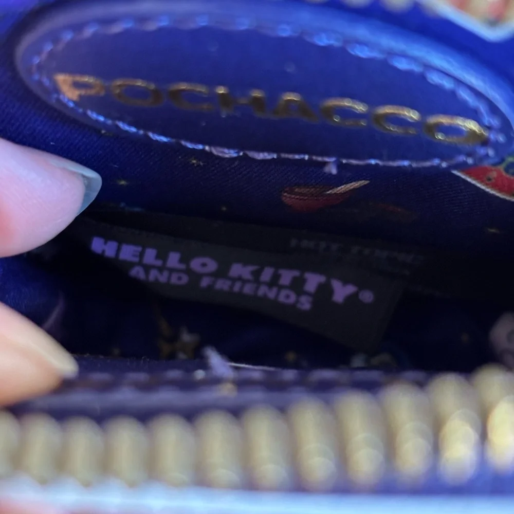 Hello kitty and friends Magic Card Coin Purse.‎  Pochocco.  Like new